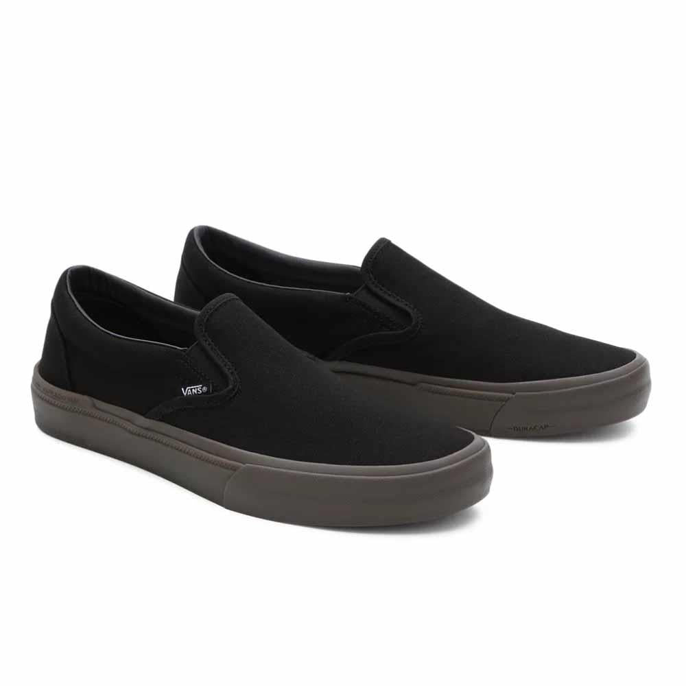 All black leather hot sale vans slip ons