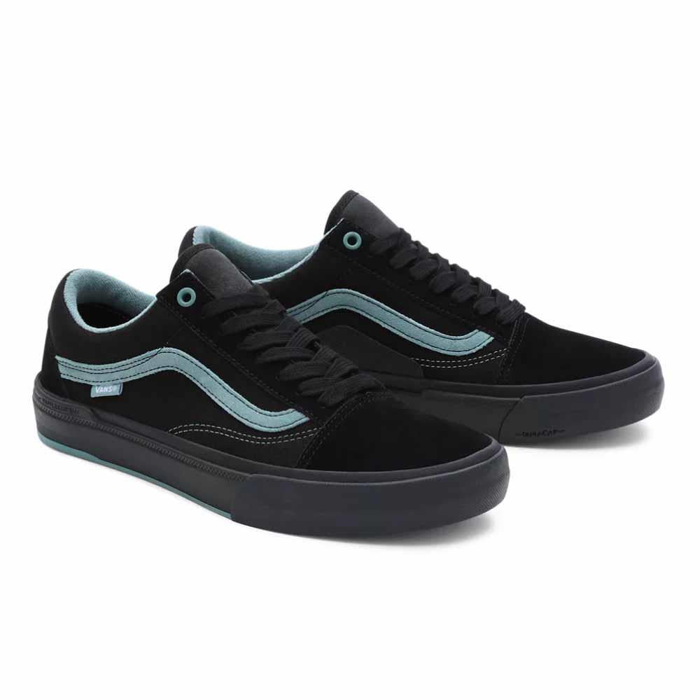 Black and on sale teal vans